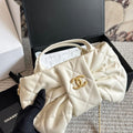 Chanel - Lambskin Quilted Mini Bow